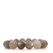 Chocolate moonstone bracelet shown from the front, with polished round beads in grey, taupe and cream.
