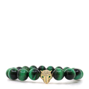 Green tiger's eye bead bracelet with a gold-plated jaguar head and green cubic zirconia eyes, front view.
