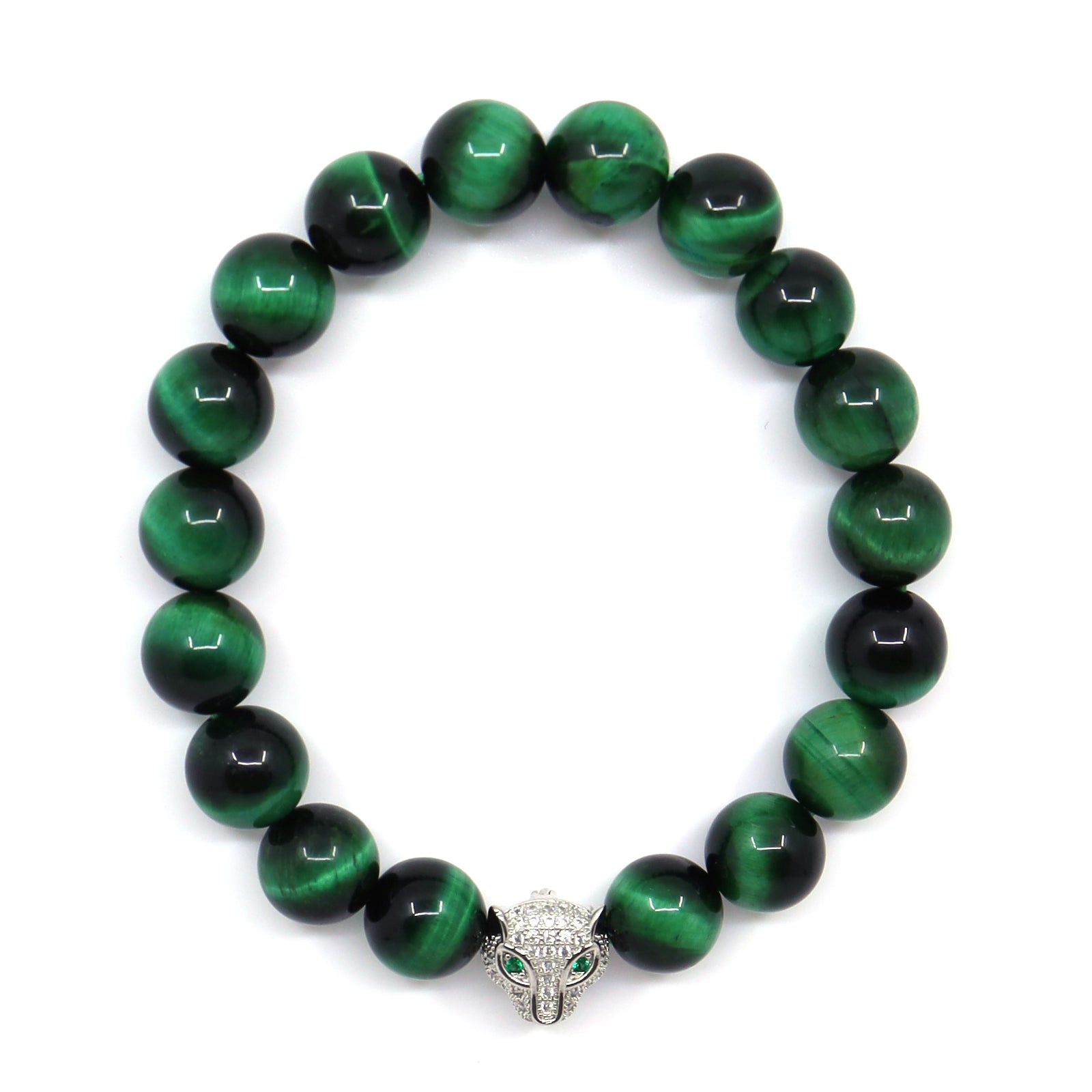 Overhead view of a green tiger's eye bracelet with round banded beads and a gold-toned jaguar head.