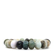 Side view of the Burma jade bracelet showing rounded bead shapes, polished surfaces and natural colour variations.